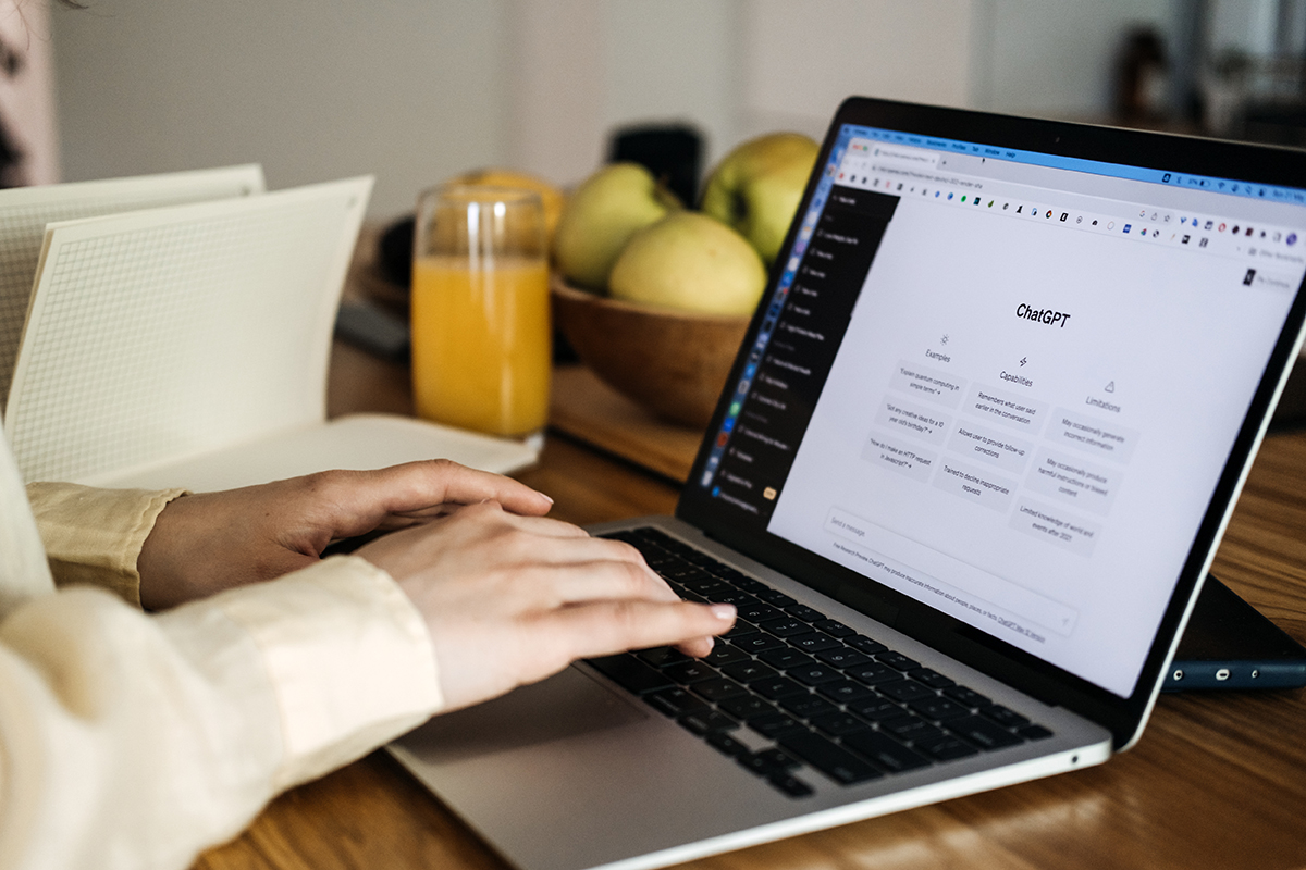 ChatGPT for content creators, ChatGPT help generate ideas and create content. Screen with ChatGPT AI or artificial intelligence chat and typing female hands. Warsaw, Poland May 02, 2023
